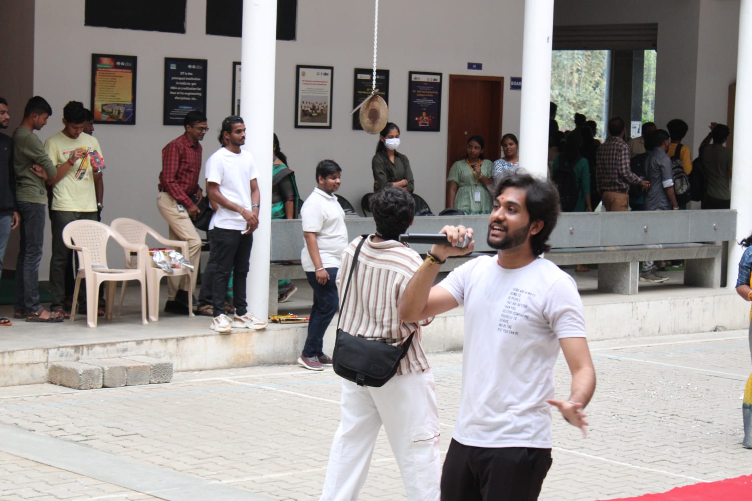 Hyping up the crowd in the courtyard