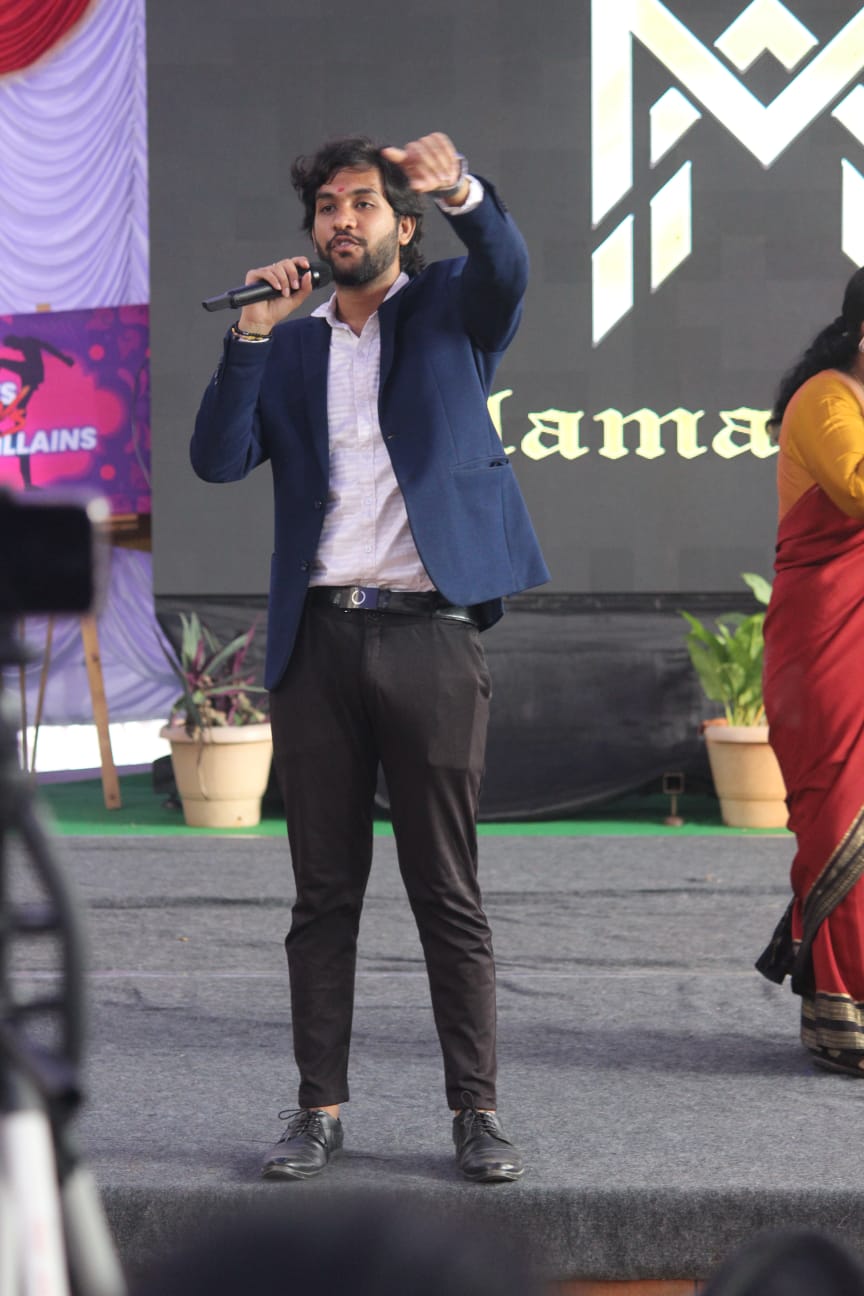 Pointing at the crowd on stage