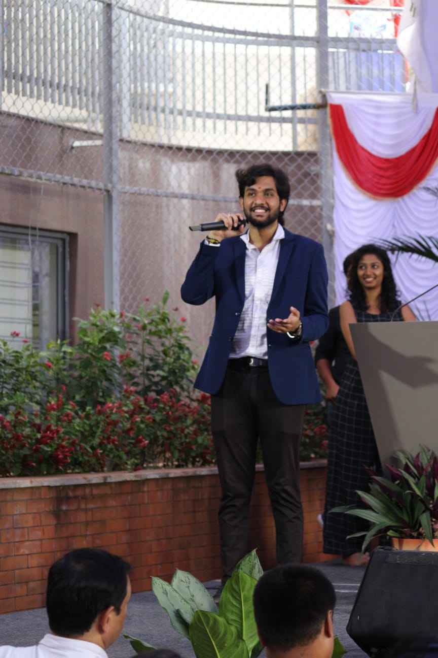 Smiling while hosting outdoors