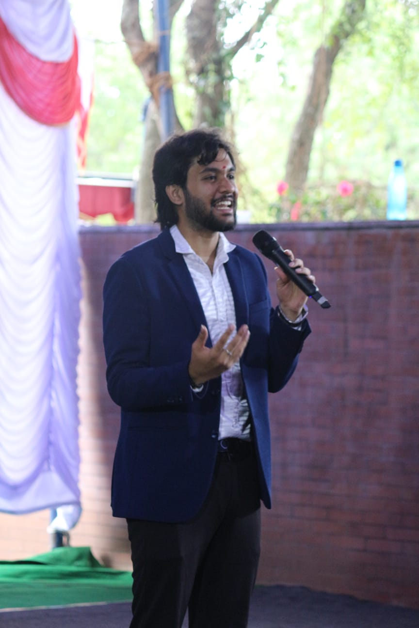 Laughing mid-sentence on stage